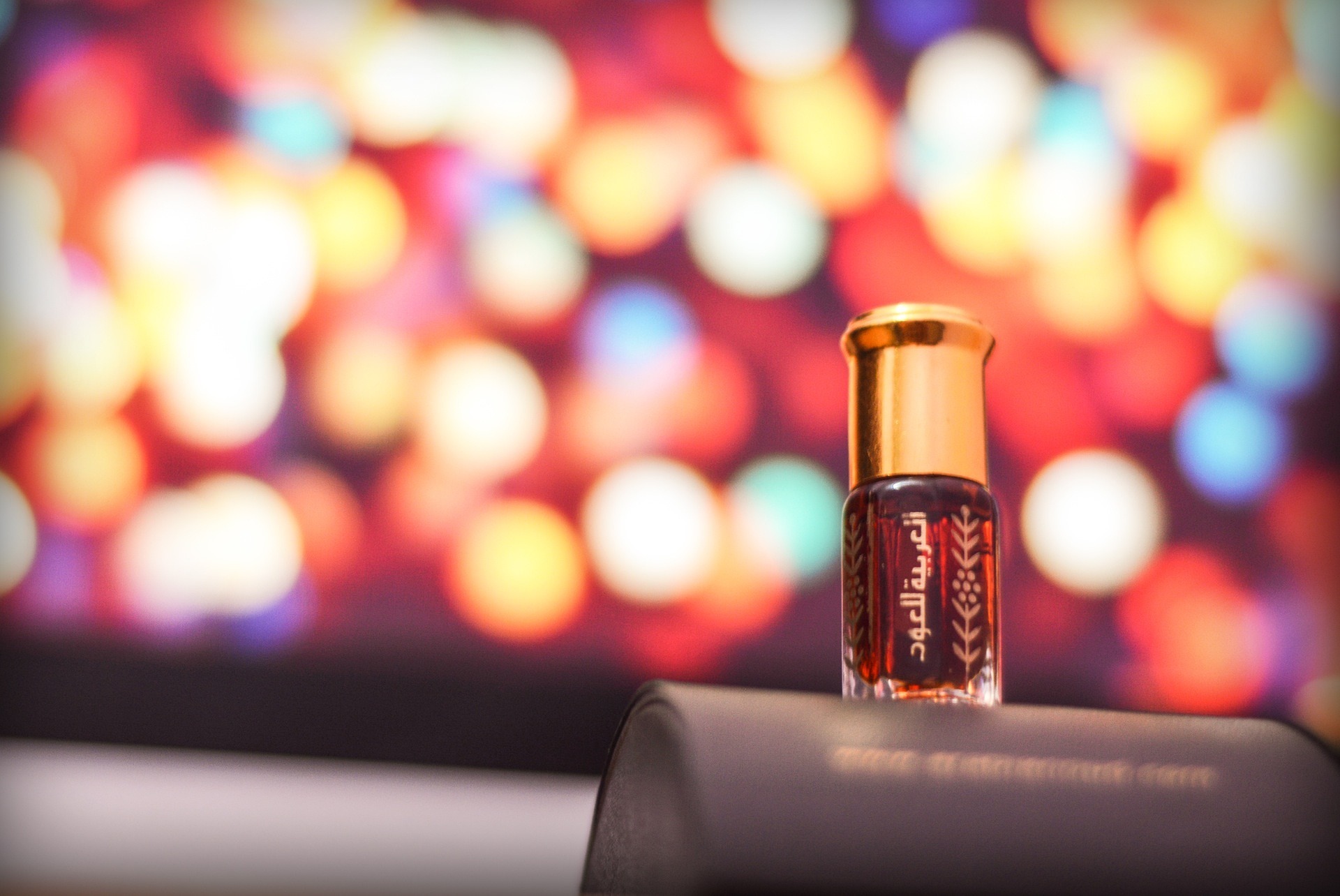 Private Label 1 perfume bottle with bokeh lights